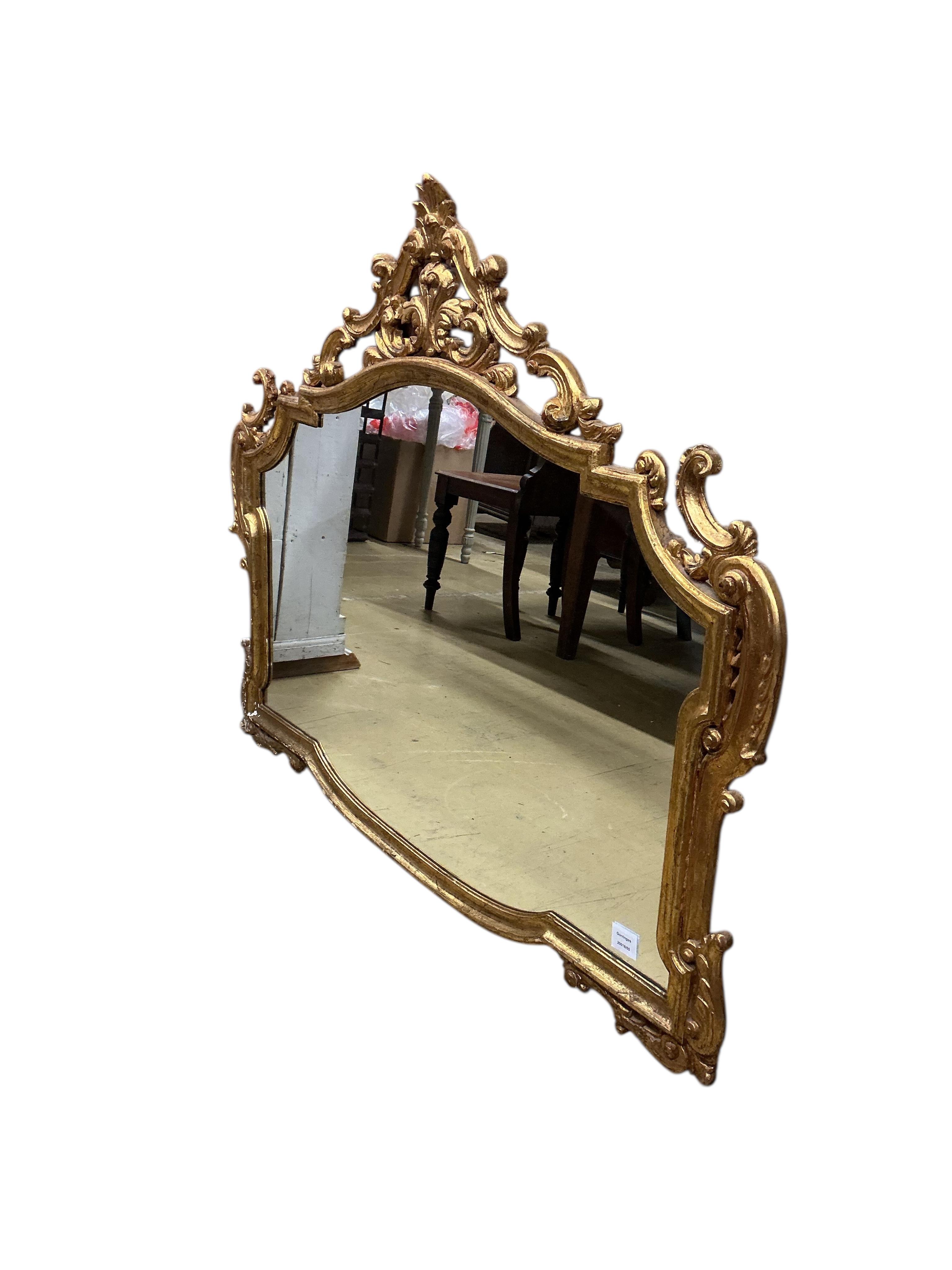 A Victorian style carved giltwood and composition wall mirror, width 120cm, height 95cm